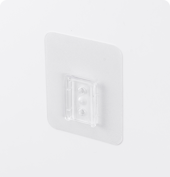 Slot backing permanent adhesive